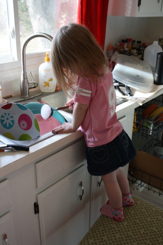 Blythe doing dishes